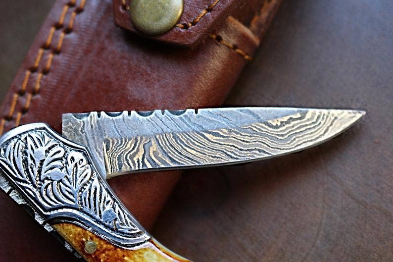 Damascus Steel handmade Pocket Knife with burnt bone
handles
