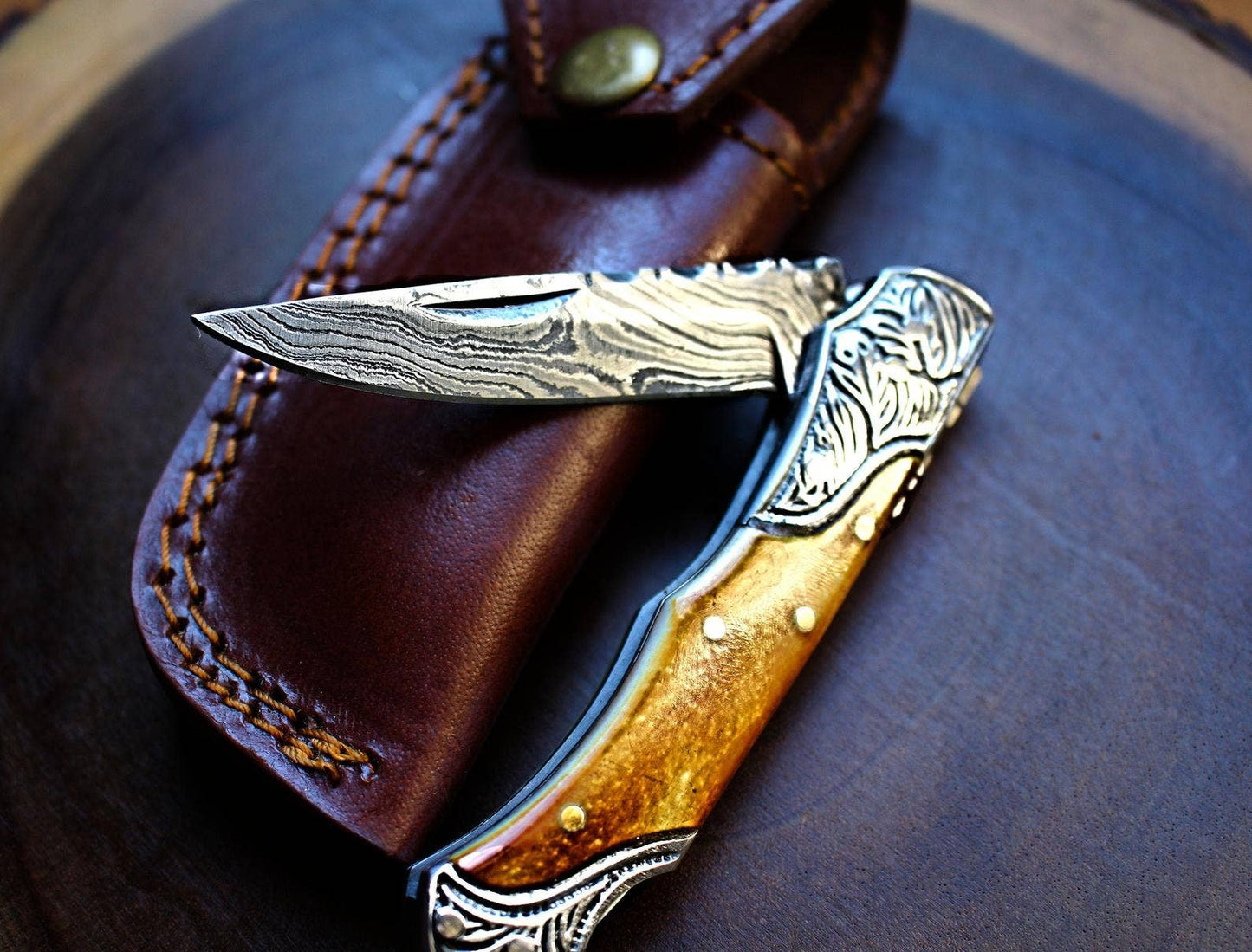 Damascus Steel handmade Pocket Knife with burnt bone
handles