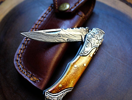 Damascus Steel handmade Pocket Knife with burnt bone 
handles