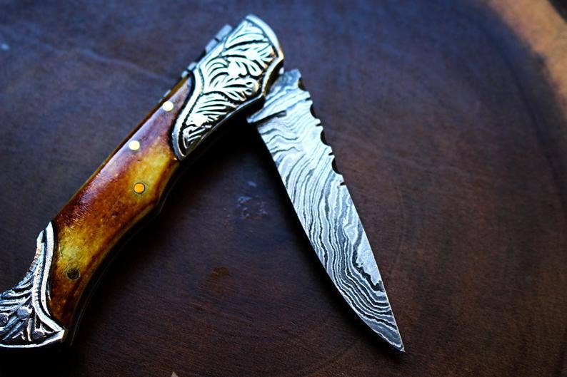 Damascus Steel handmade Pocket Knife with burnt bone
handles